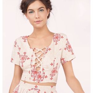 Patterned lace up crop top